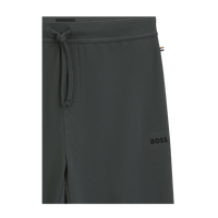 Dark green textured lounge pants with a brand logo on a white background