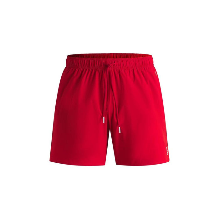Fully lined swim shorts by BOSS, detailed with signature stripes and a logo.