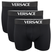 Three black Versace boxer briefs on a white background