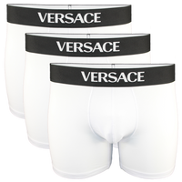 Three pairs of Versace white boxer briefs with black waistbands on a white background.
