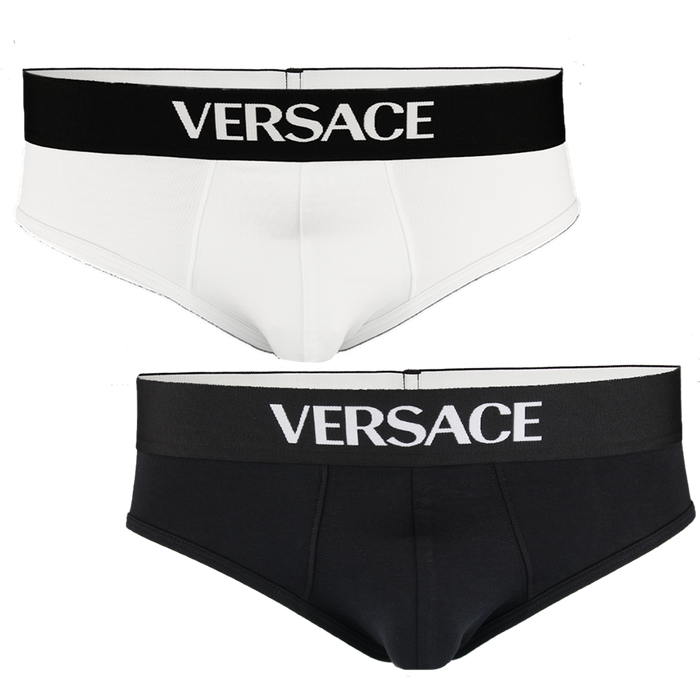 Two pairs of Versace underwear, one white and one black, on a white background.
