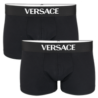 Two black Versace boxer trunks on a white background