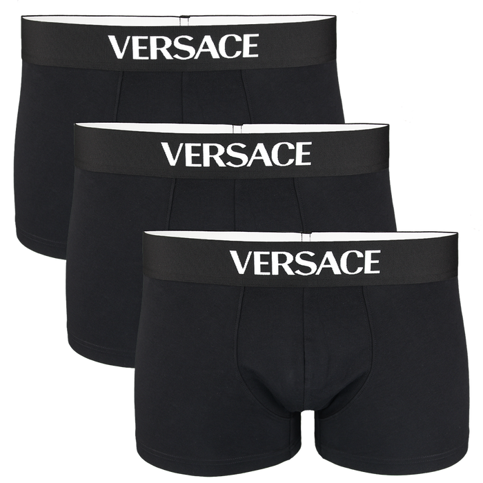Three black Versace boxer trunks on a white background
