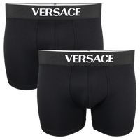 Two black Versace boxer briefs on a white background