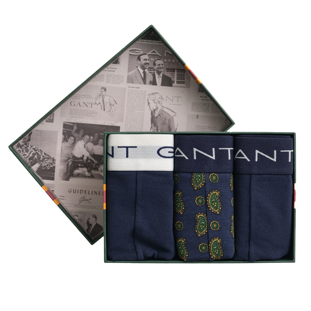 Set of Gant boxers  in a branded box with a newspaper design on the lid.