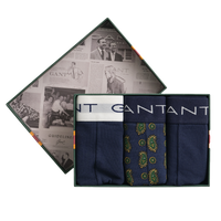 Set of Gant boxers  in a branded box with a newspaper design on the lid.