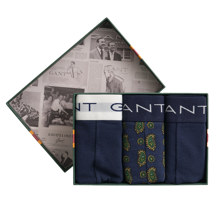 Set of Gant boxers  in a branded box with a newspaper design on the lid.