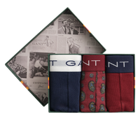 Set of GANT underwear in a decorative box with branded newspaper background