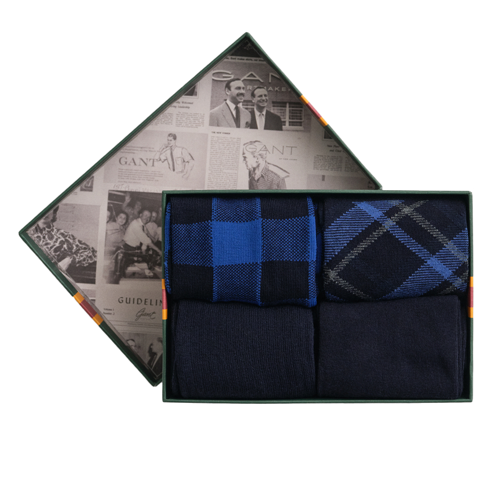 Set of men's socks in a decorative box with a patterned design.