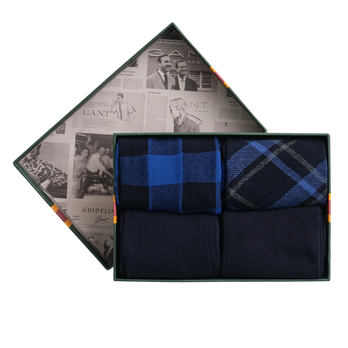 Set of men's socks in a decorative box with a patterned design.