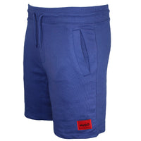 Blue shorts with a red patch on a white background