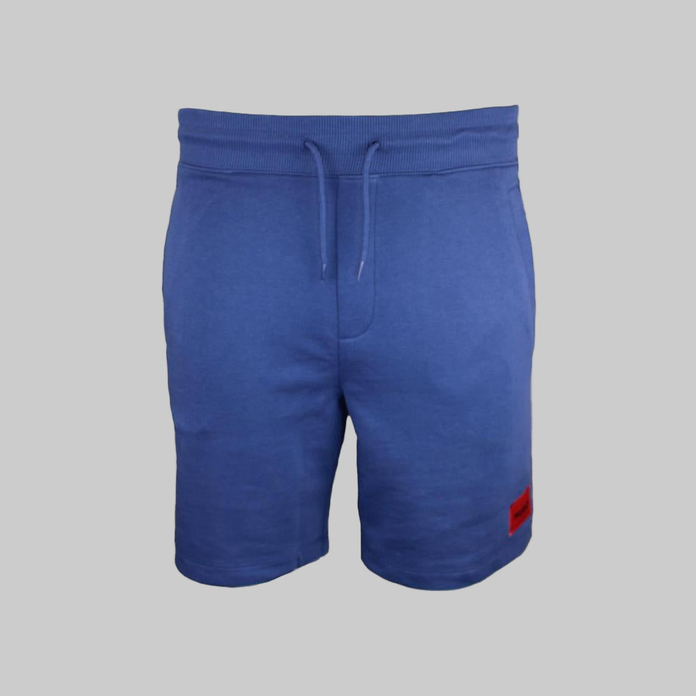Blue shorts with a red tag on a white background