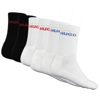 Set of black and white socks with 'HUGO' branding on a white background