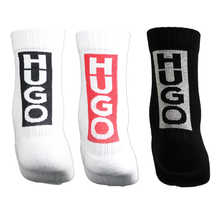 Three socks with 'HUGO' branding on a white background