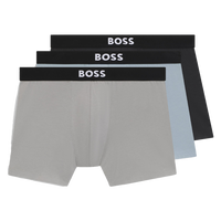 Three pairs of BOSS boxer briefs in gray, black, and light blue on a white background.