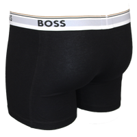 Black boxer briefs with a white waistband featuring 'BOSS' branding on a white background.