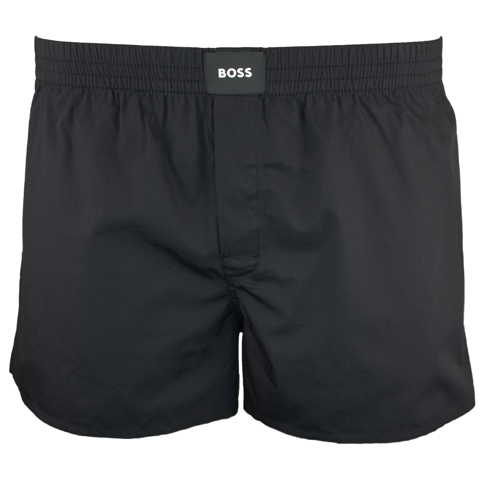 Black boxer shorts with 'BOSS' label on a white background