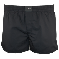 Black boxer shorts with 'BOSS' label on a white background