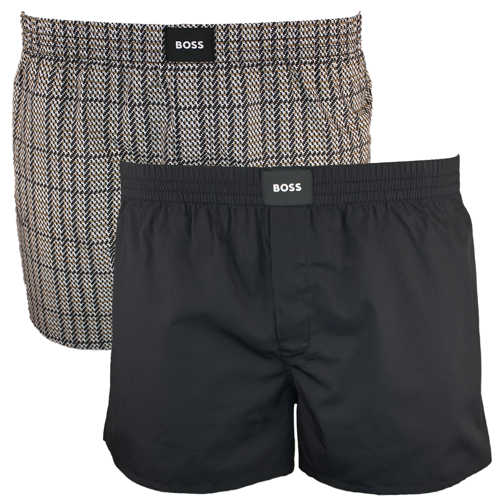 Two pairs of boxer shorts, one patterned and one black, with BOSS branding.