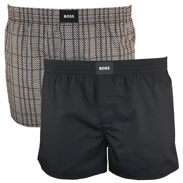 Two pairs of boxer shorts, one patterned and one black, with BOSS branding.
