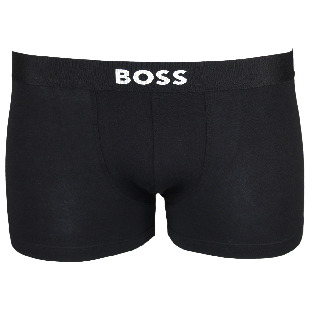 Black boxer trunks with 'BOSS' logo on a white background