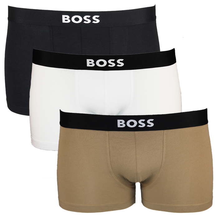Three pairs of BOSS branded boxer trunks in black, white, and beige on a white background.