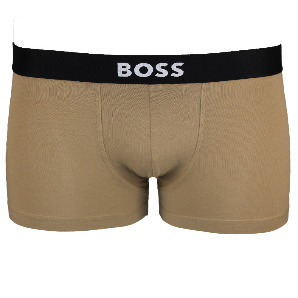 Beige boxer trunkss with a black waistband featuring the 'BOSS' logo on a white background.