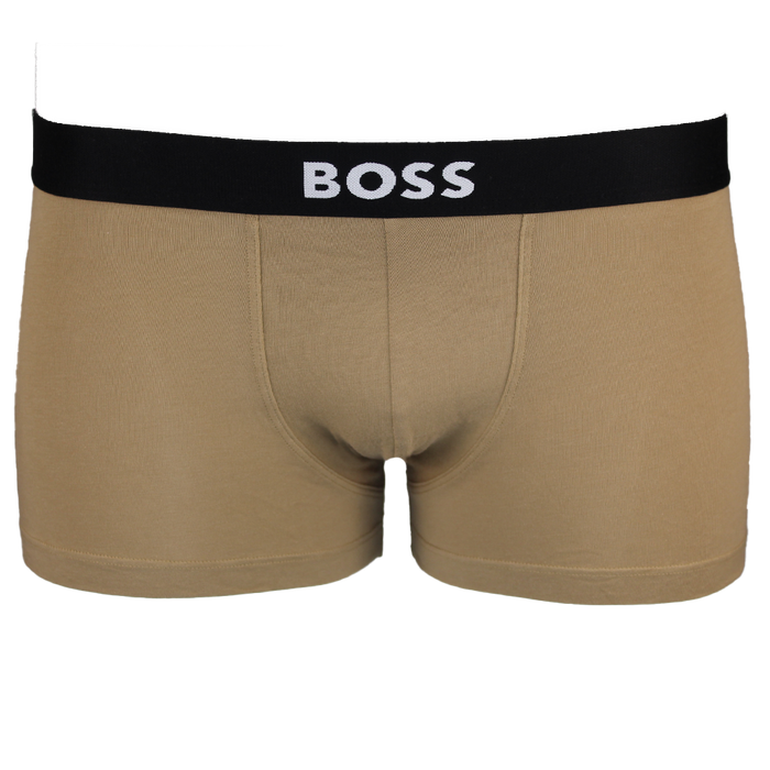 Beige boxer trunkss with a black waistband featuring the 'BOSS' logo on a white background.