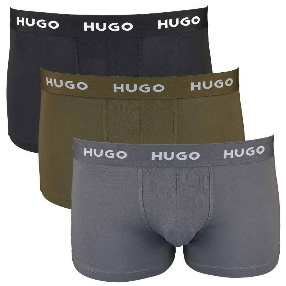 Three pairs of HUGO boxer trunks in black, green, and gray on a white background.