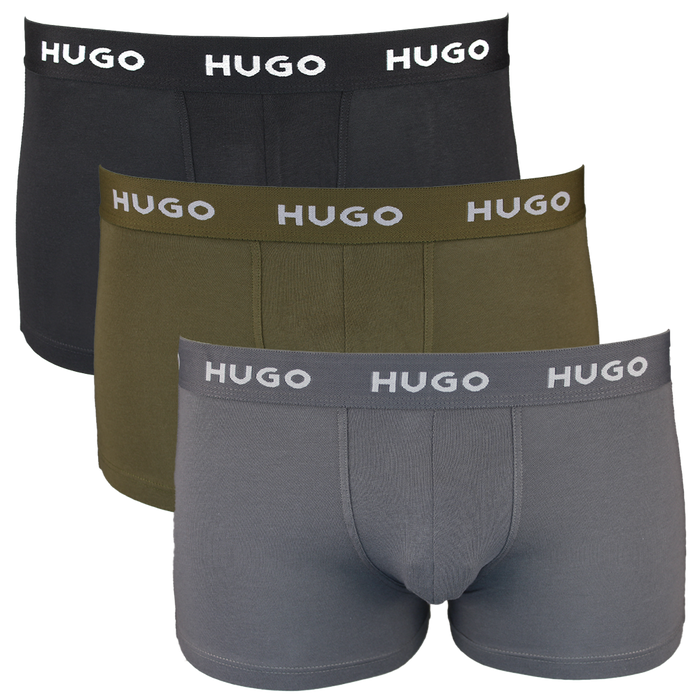 Three pairs of HUGO boxer trunks in black, green, and gray on a white background.