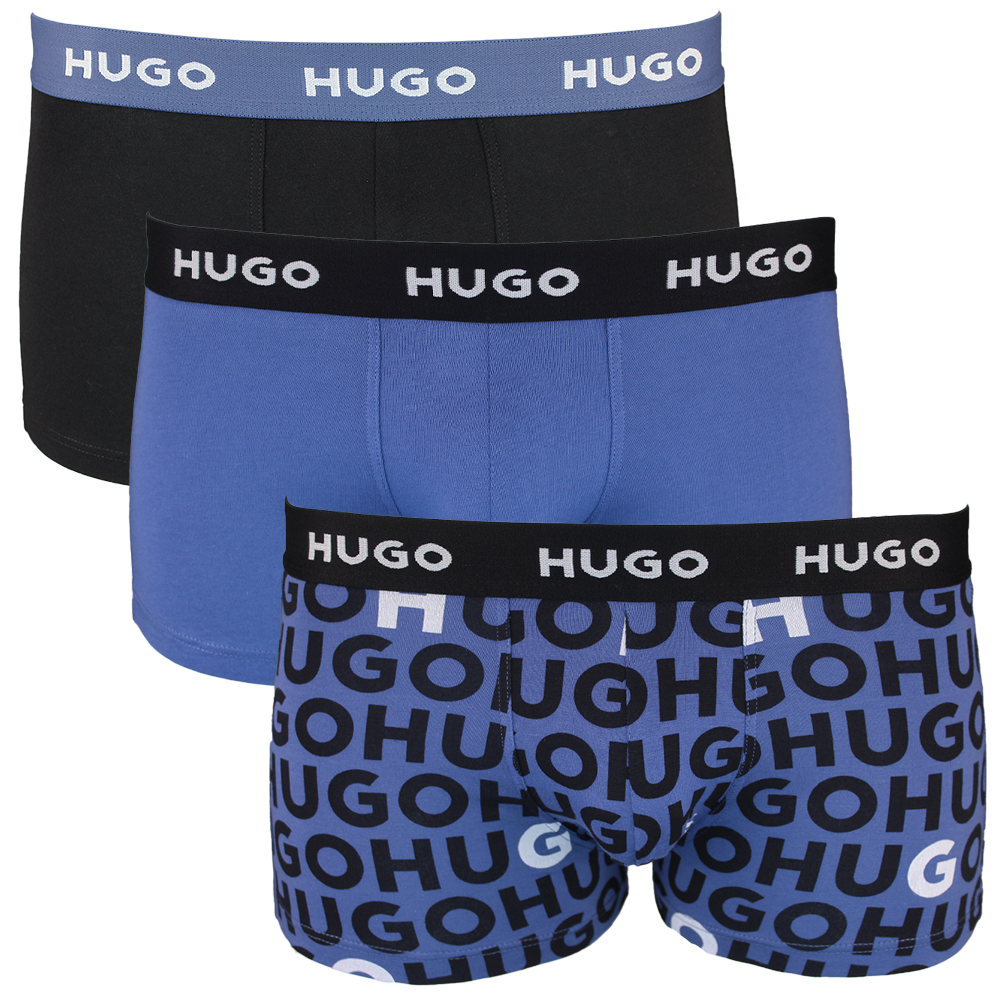 Three pairs of Hugo Boss boxer trunks in different styles on a white background.