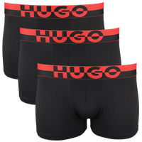 Three black modal boxer trunks with split Hugo logo waistband.