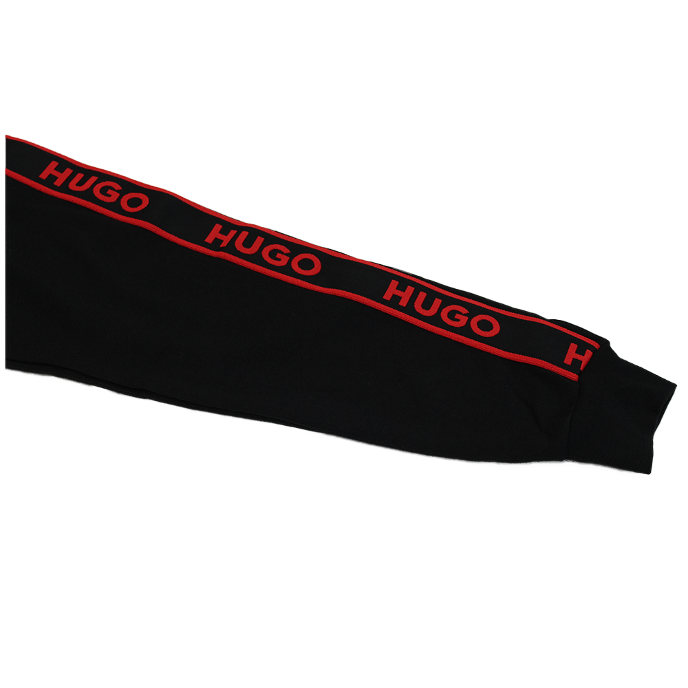 Black sleeve with red 'HUGO' branding on a white background