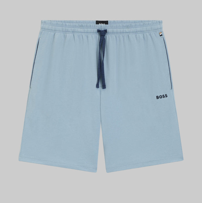 Light blue shorts with a brand logo on a white background