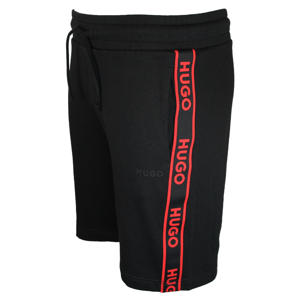 Black shorts with red Hugo branding repeated on leg