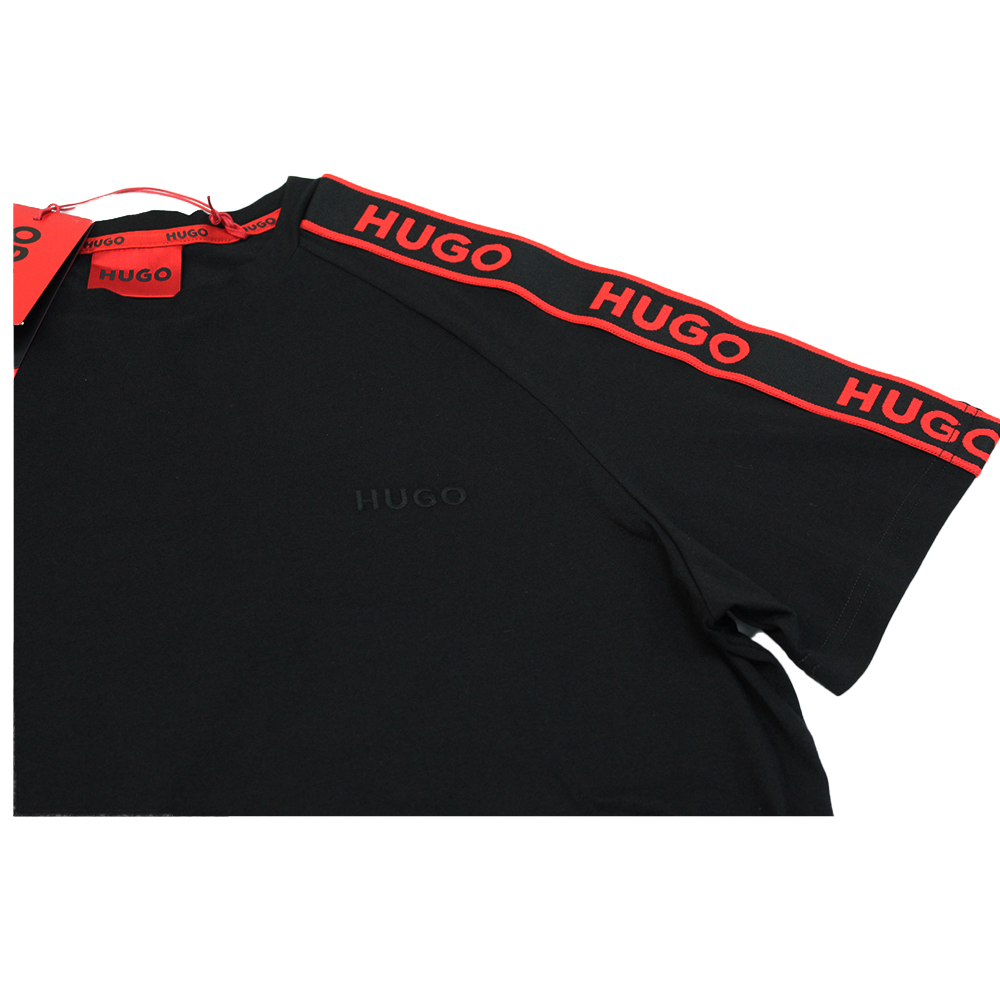 Black t-shirt with red 'HUGO' branding on a white background