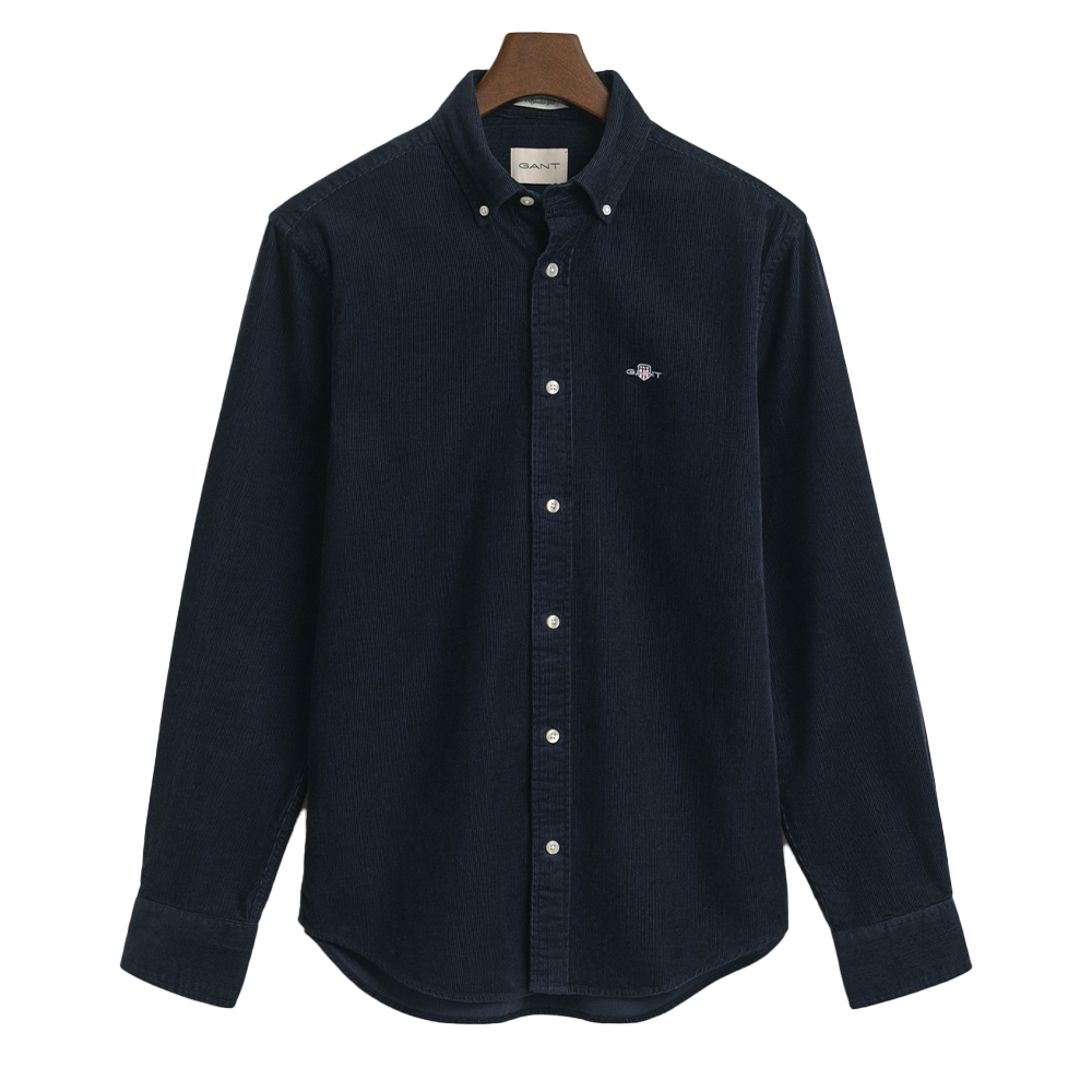 Navy blue shirt on a hanger with a white background