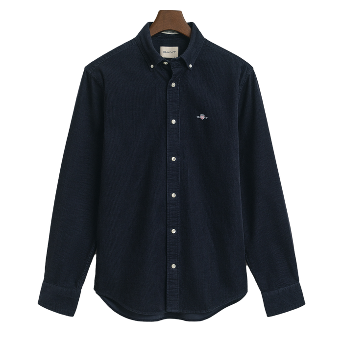 Navy blue shirt on a hanger with a white background