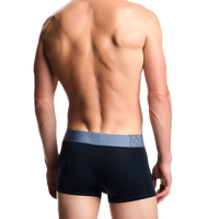 Rear view of blue Armai boxer trunks with mega logo