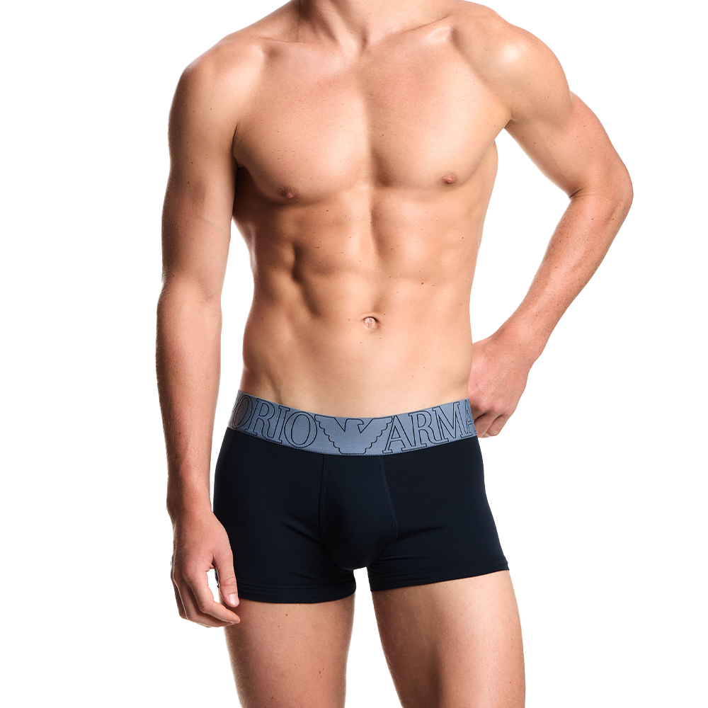 model wearing blue Armani boxer trunks on a model