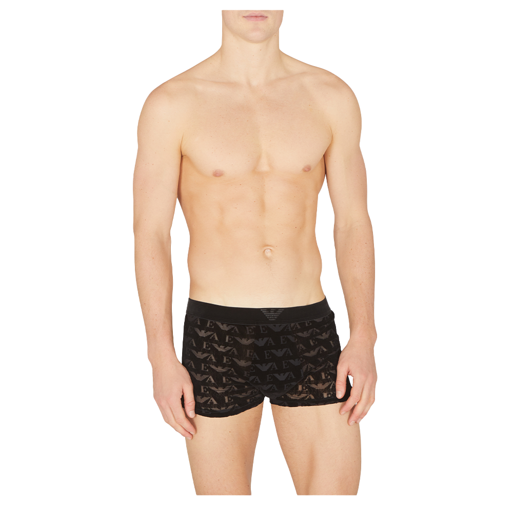 Man wearing black underwear on a white background
