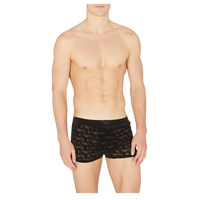 Man wearing black underwear on a white background