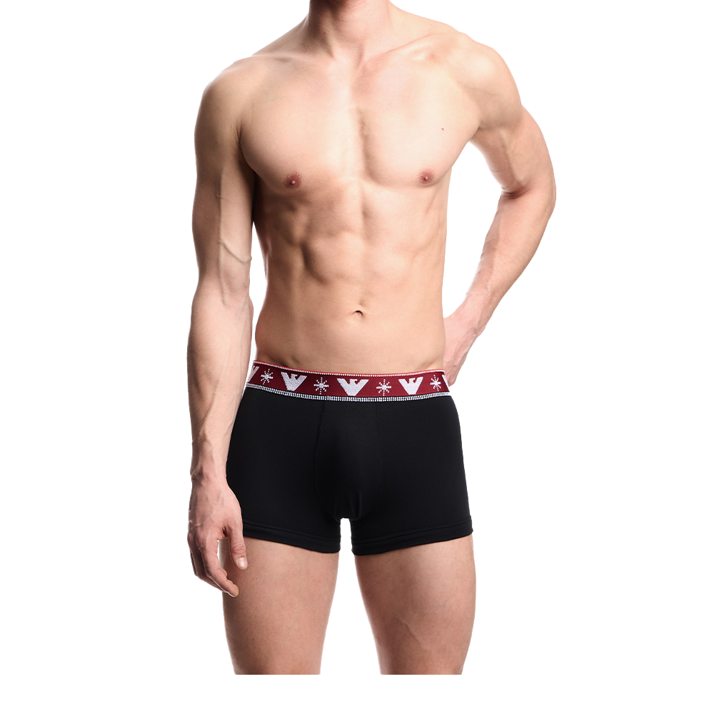 Black boxer trunks  with a red and white waistband on a white background