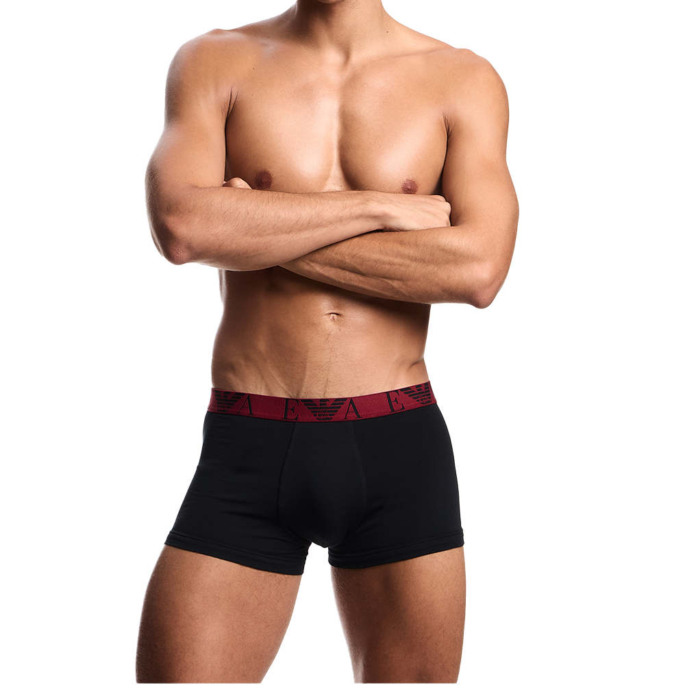 model  wearing  Armani boxer trunks with red waistband 