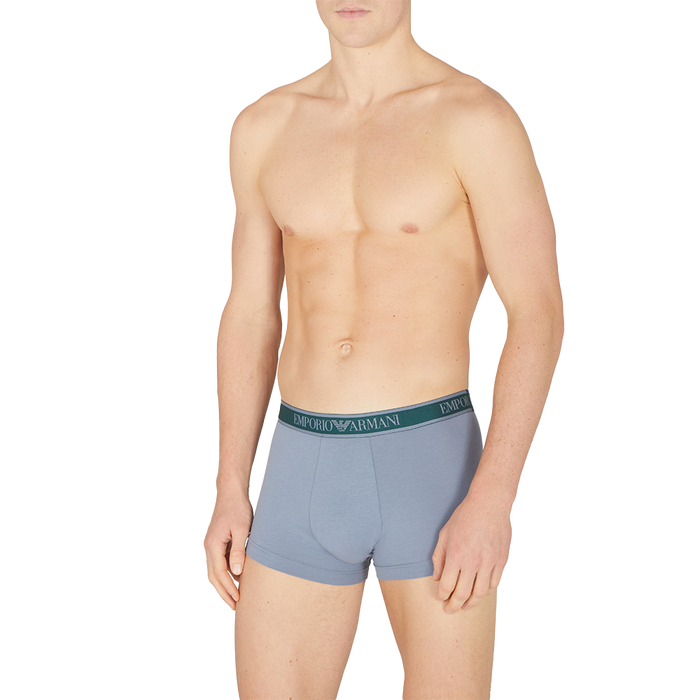 model wearing grey Armani boxer trunks