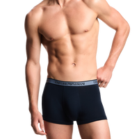 model wearing Armani blue boxer trunks