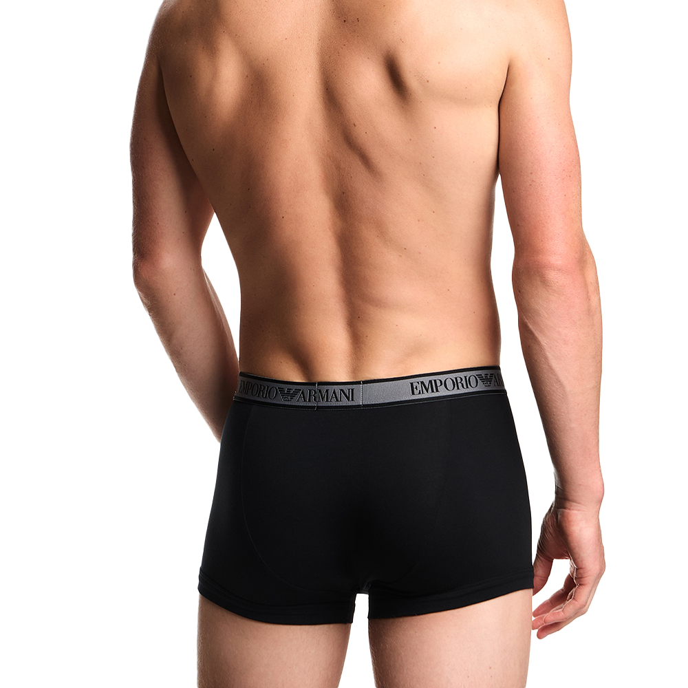 back view of a model wearing Emporio Armani boxer trunks black with contrast waistband