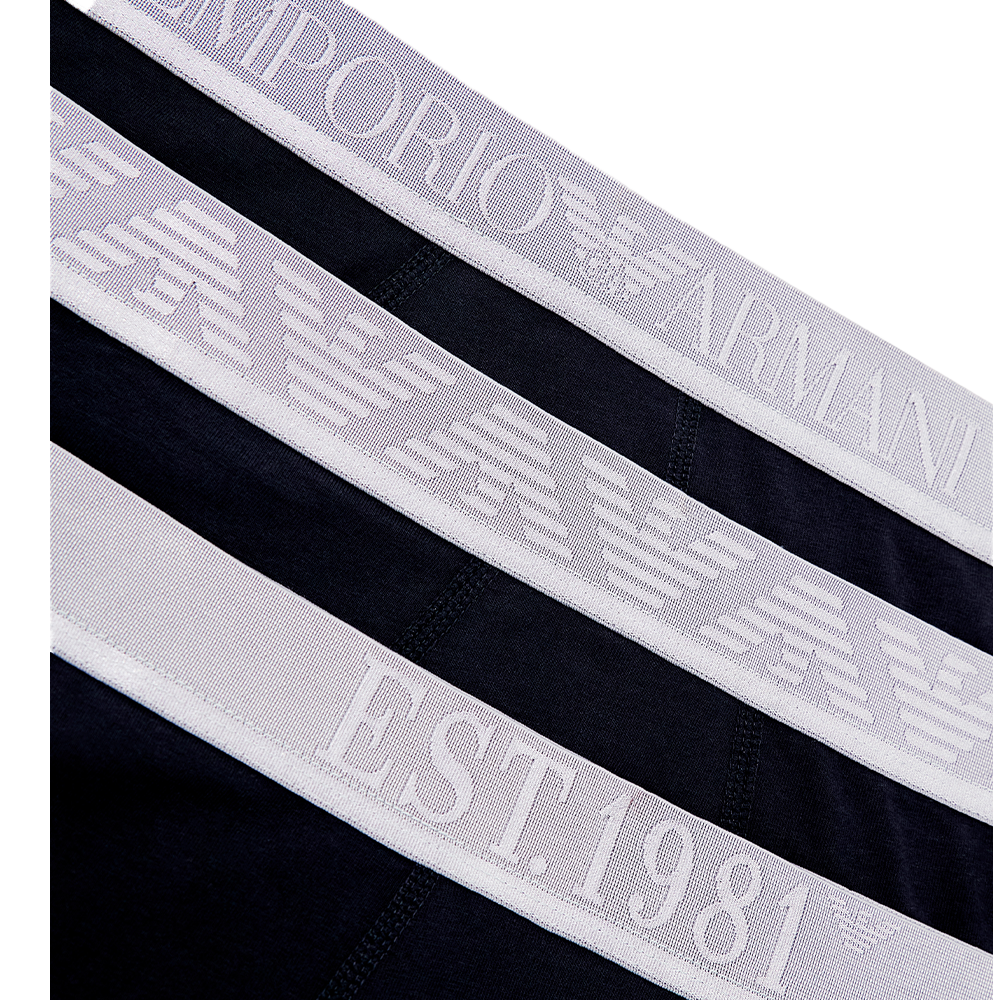 Detail view of Armani black boxer trunks waistbands in silver