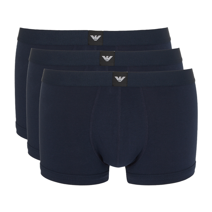 Three pairs of navy blue boxer briefs with Armani brand logos on a white background