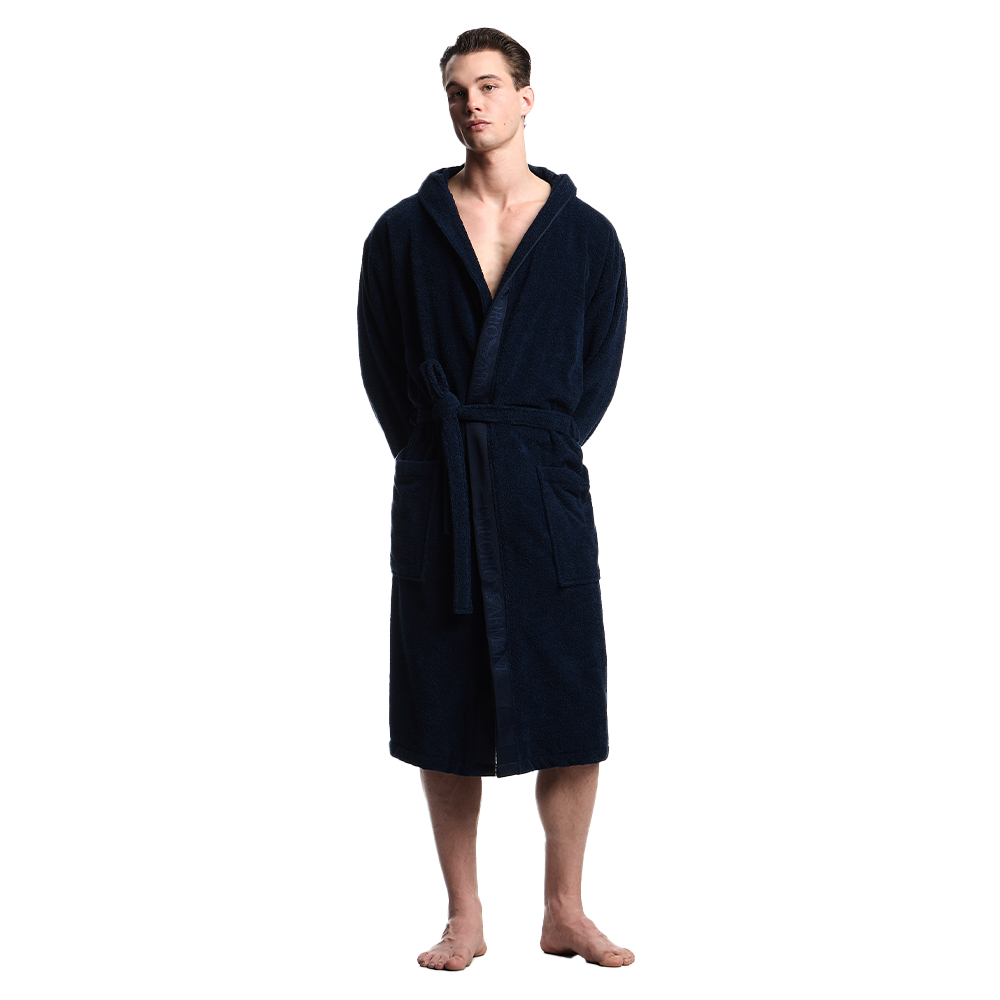 Man wearing a navy blue robe on a white background